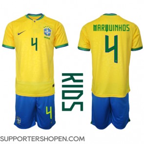 Brasilien Marquinhos #4 Hemmatröja Barn VM 2022 Kortärmad (+ korta byxor)